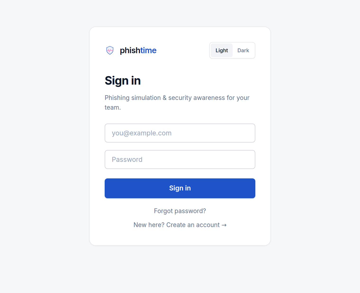 The Phishtime sign-in page, used for both admin and employee portal sign-in, with email and password fields and a light/dark toggle